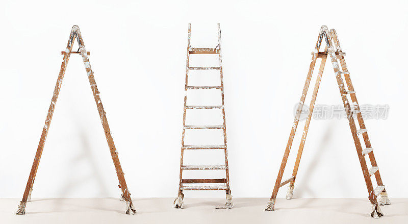 油漆工木梯，孤立上白，墙画概念