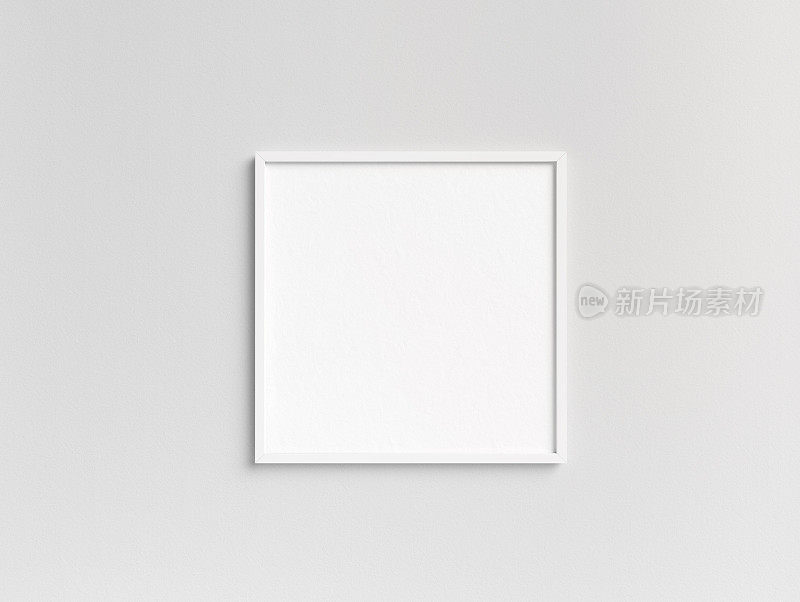 空白的方形白色相框模板挂在墙上