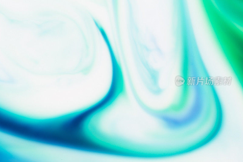 墨色漩涡背景在绿松石，蓝色，和白色
