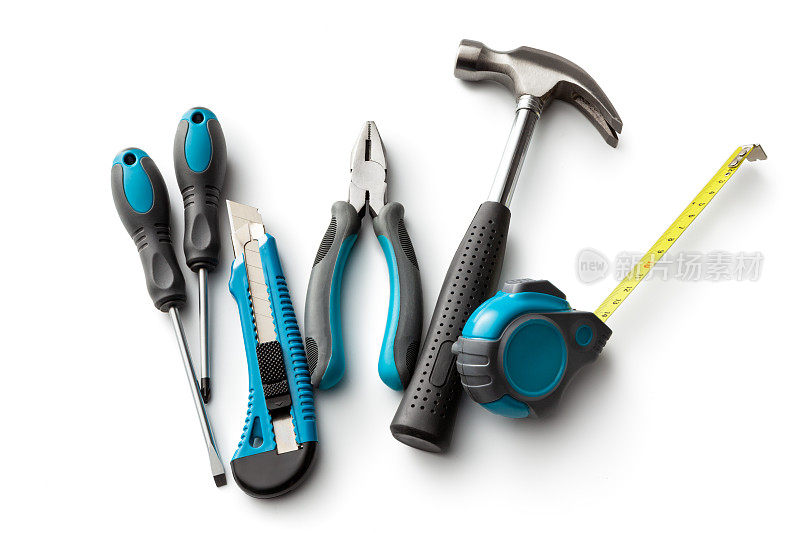 工作工具:锤子，螺丝刀，卷尺，钳子和美工刀孤立在白色背景上