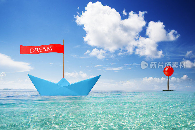 挂着“梦想”字样的纸船驶向小岛