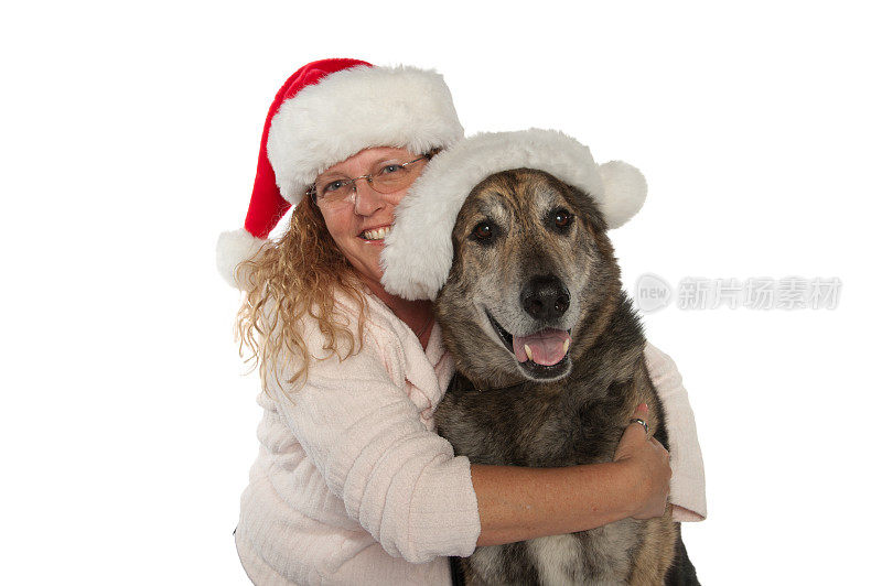 女人、狗和圣诞老人帽