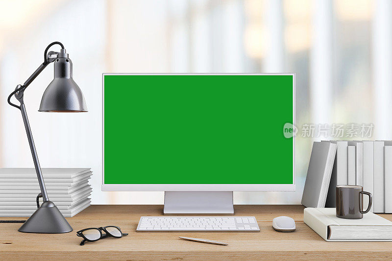 办公桌与大型PC电脑屏幕与绿色背景-模板