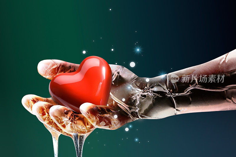 医用机器人的金属人工智能机器人的手抓住了一个红色的心形心脏。