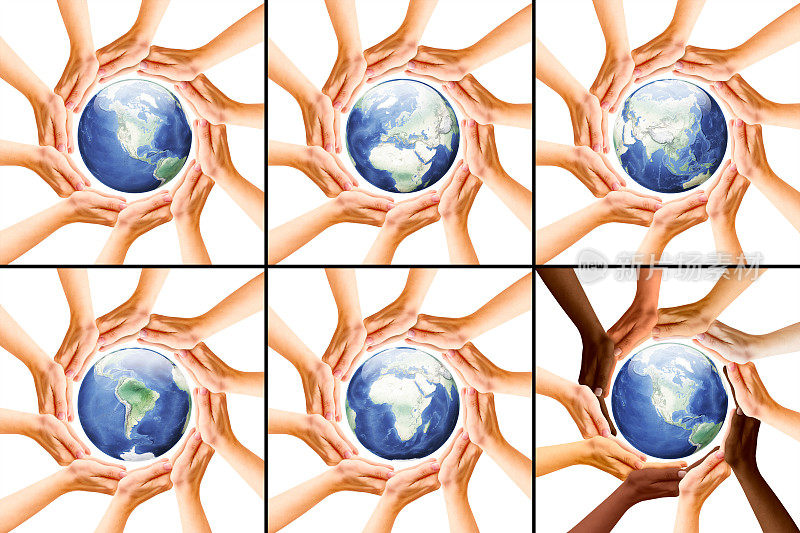 人类的双手和地球展示地球的不同部分