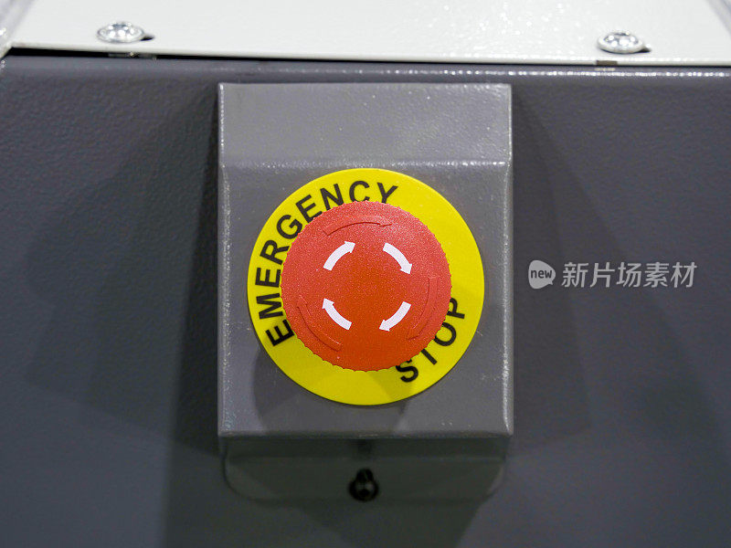 红色按钮工业设备紧急停止。终止和停止概念。