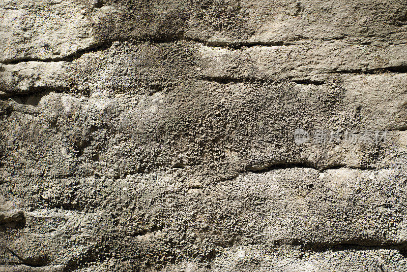 背景、纹理:灰色粗糙的天然石材表面