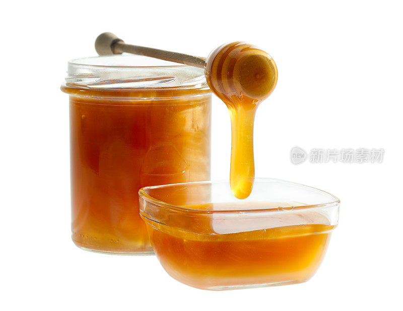 蜂蜜从滴管倒入碗中
