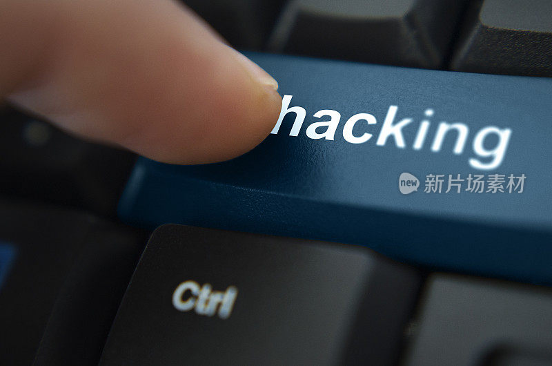 安全概念:黑客入侵电脑键盘背景