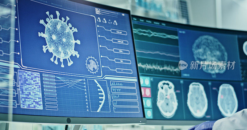 实验室设备。屏幕上的冠状病毒和脑电波研究。科学家的侧视图