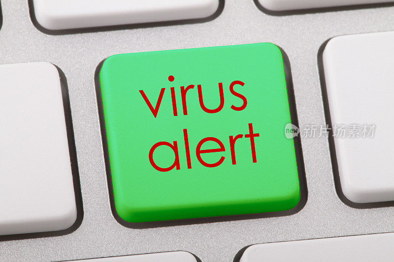 电脑键盘上的病毒警告字。