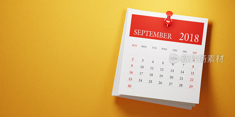 把九月的日历贴在黄色的背景上