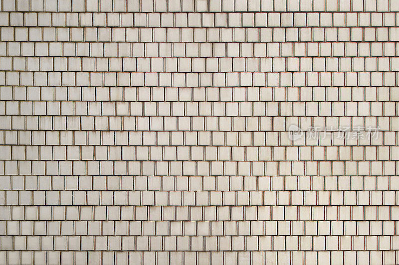 灰蒙蒙的乳白色瓷砖墙