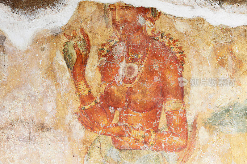 一幅古代壁画，描绘的是斯里兰卡一个赤裸上身的西吉里亚女士