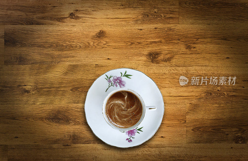 咖啡杯顶视图木制桌子的背景