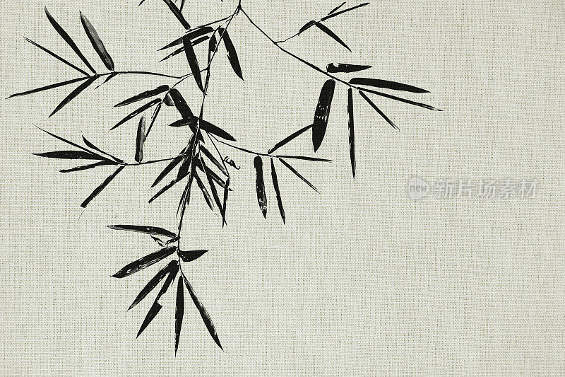 黑色竹叶和竹枝的织物纹理背景