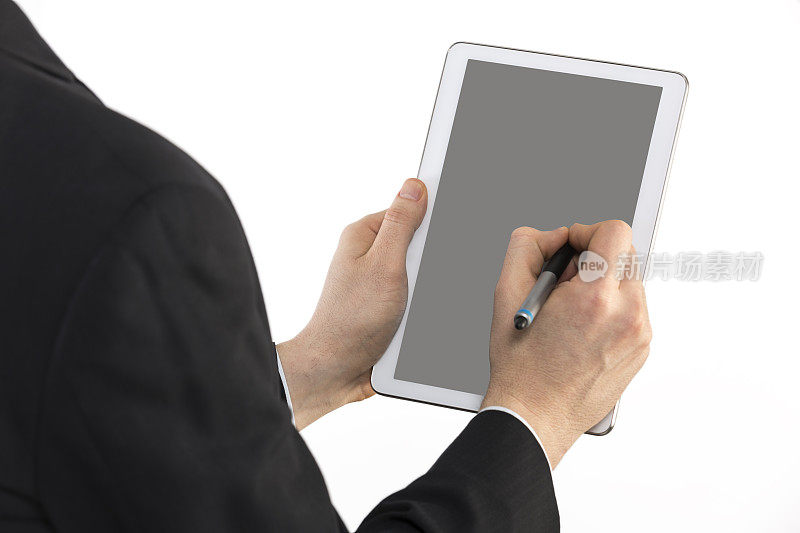 商人使用数字平板电脑和触控笔