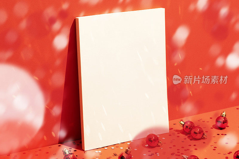 杂志模型，在五彩纸屑雨下的红色圣诞背景上的模板