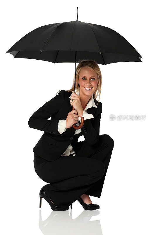 拿着伞的女商人