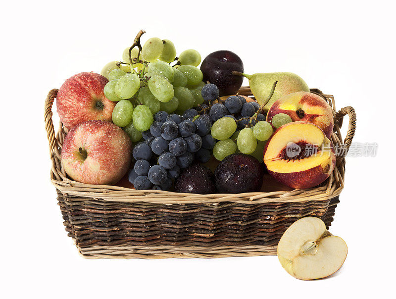篮子里的水果和半个苹果