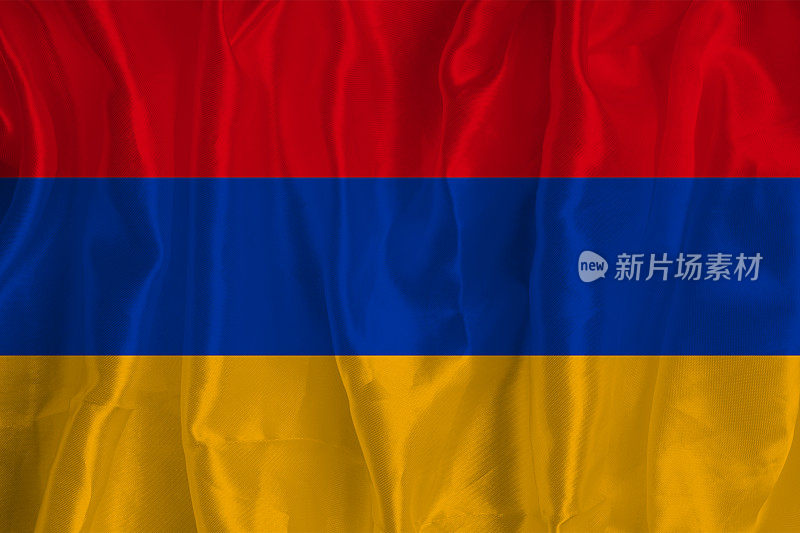 以丝绸为背景的亚美尼亚国旗是伟大的国家象征。国家的官方国家象征。亚美尼亚国旗背景
