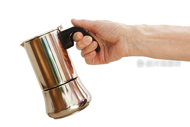 成熟女人拿着咖啡壶的手