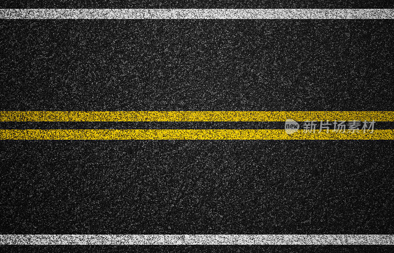 黑色道路图形与黄色中心标志和白色