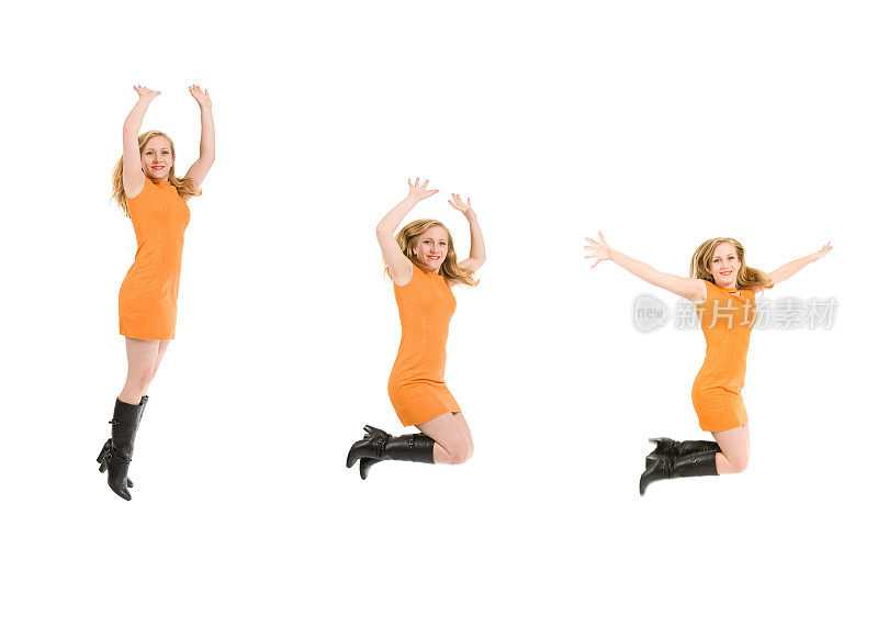 穿着橙色裙子的快乐跳跃女人