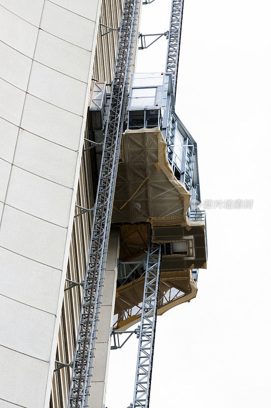 特写建筑电梯舱在摩天大楼，复制空间