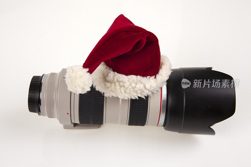 圣诞老人帽和长焦镜头