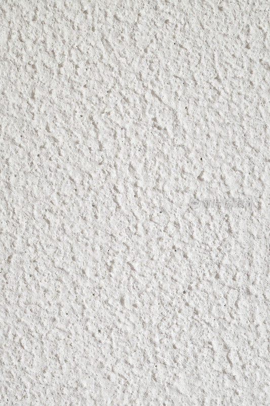 白色的灰泥涂料，粗糙的纹理，在墙上-