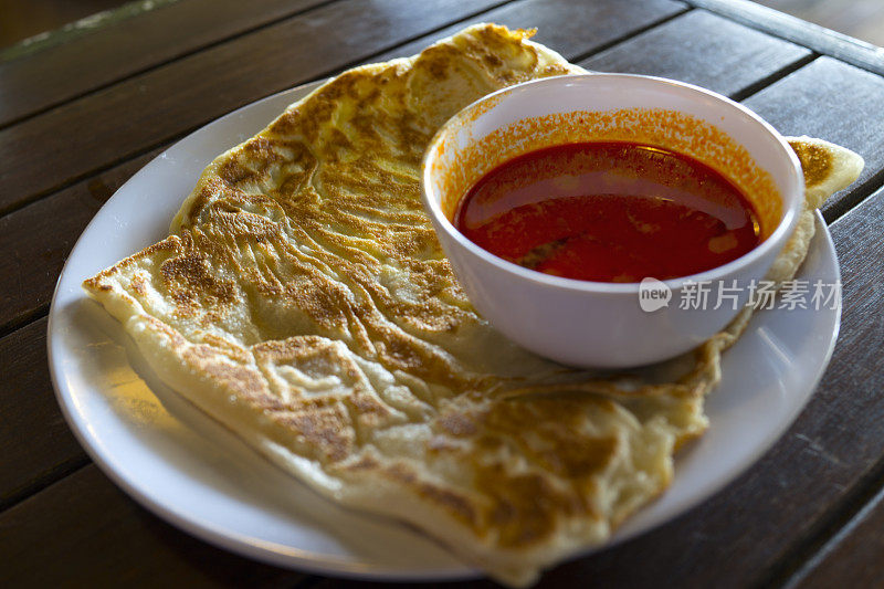 印度烤肉配咖喱是早餐