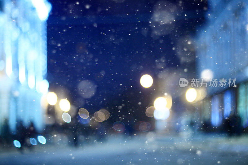 城市夜冬雪模糊背景