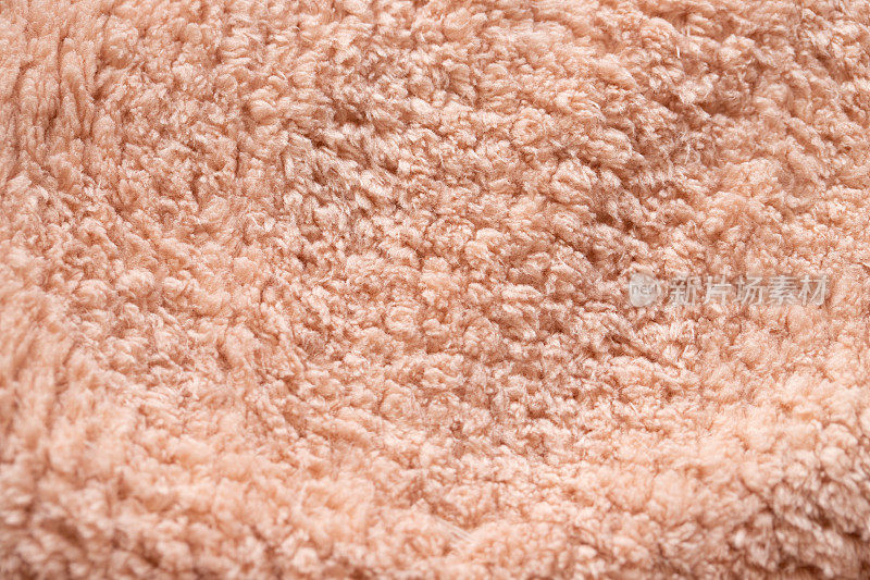 精致柔软的背景毛绒粉红色织物