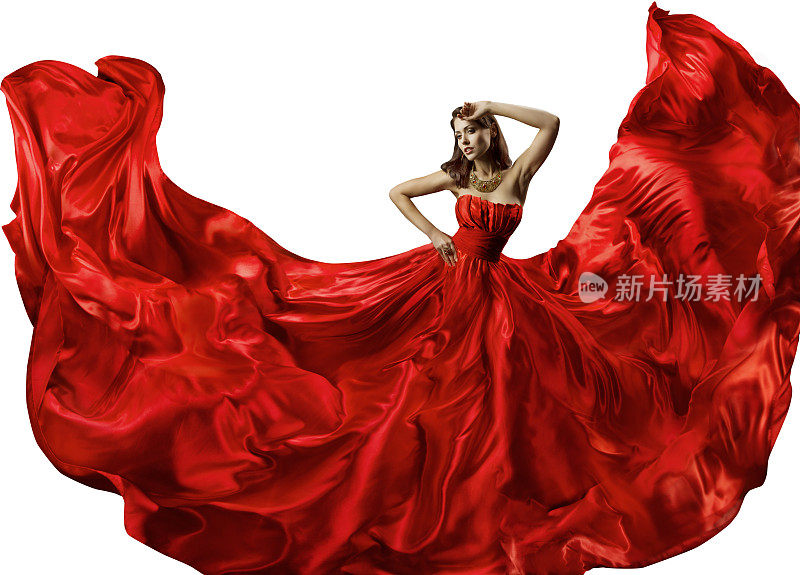 跳舞的女人在红色的裙子，时装模特跳舞在丝绸舞会礼服，挥舞流动的织物