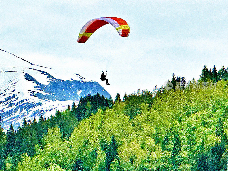 悬挂式滑翔机漂浮在斯堪的纳维亚山脉