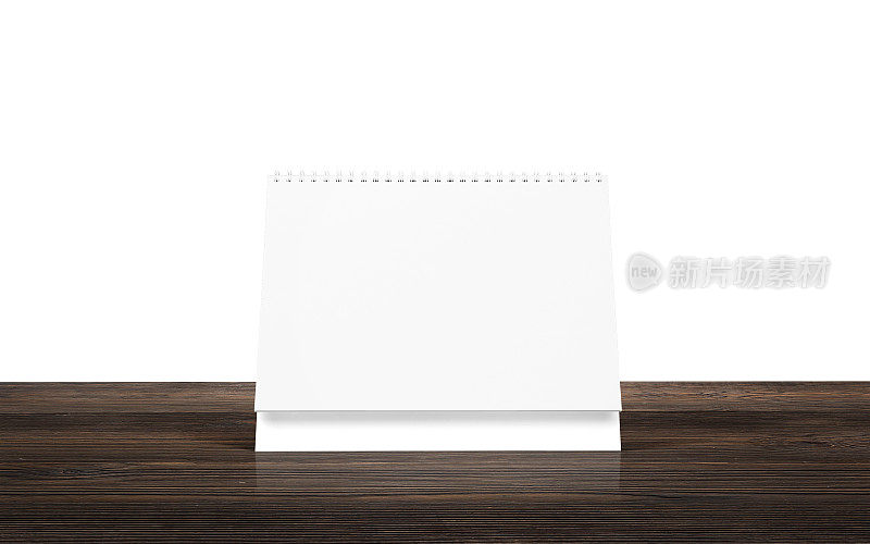 白色背景木桌上的空白台历。