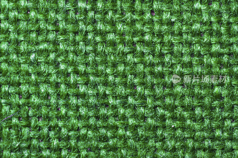 纺织背景为亮绿色粗花呢织物