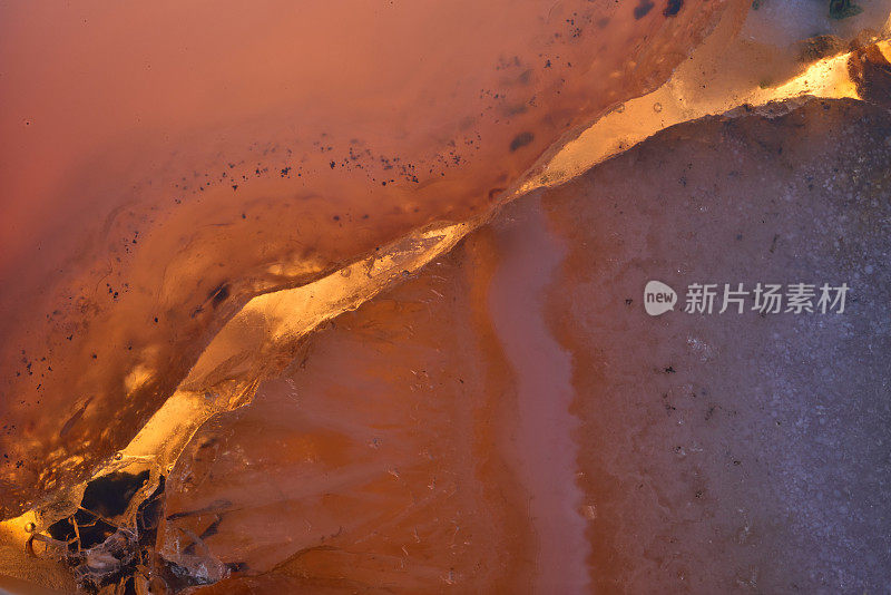 抽象美丽花哨的黄色水晶背景纹理的化石。