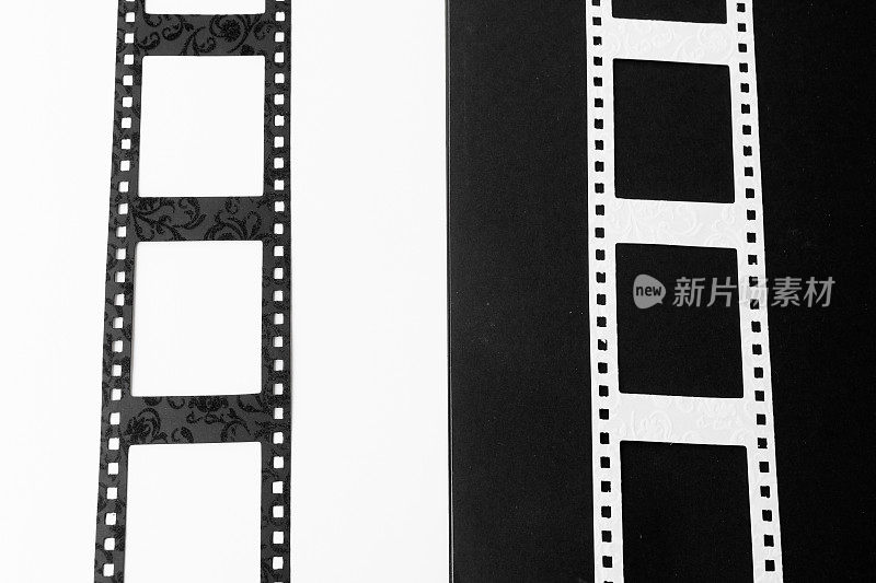 黑白摄影或胶片负片相框隔离在黑白背景的垂直位置上。带有拷贝空间。