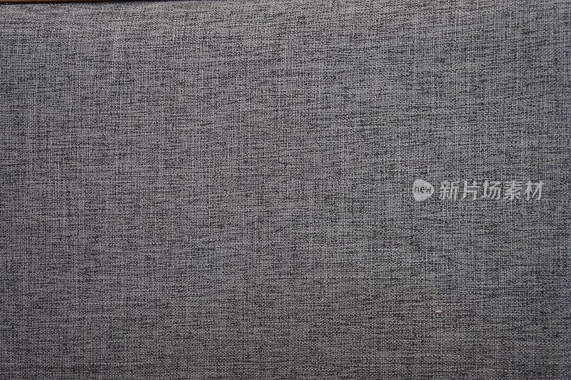 灰色棉布织物质地。棉织品可以非常柔软和舒适的第一次触摸，一个柔软的质地，使其理想的弹性和强大的休闲和休闲服装。