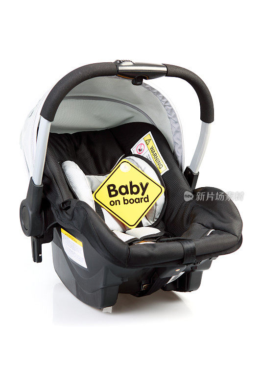 黑色婴儿座椅上有黄色警报婴儿