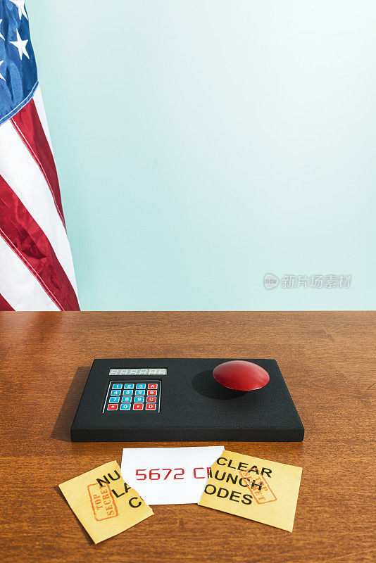 桌上有美国国旗的核弹控制板
