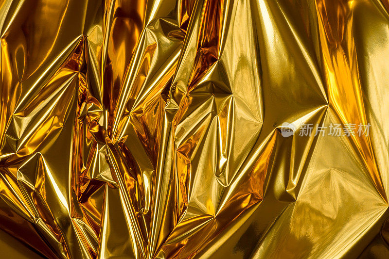 金色折叠金属箔抽象背景