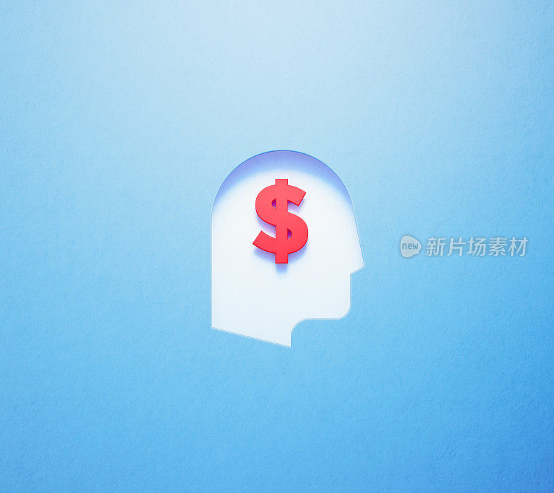 金融概念-红色美元标志坐在里面的一个白色裁剪出的人的头形状在蓝色的背景