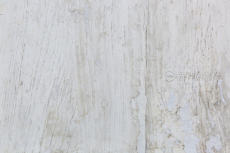 白色粉刷的木质纹理背景。粗糙的，老化的，破旧的，破碎的，脱落的