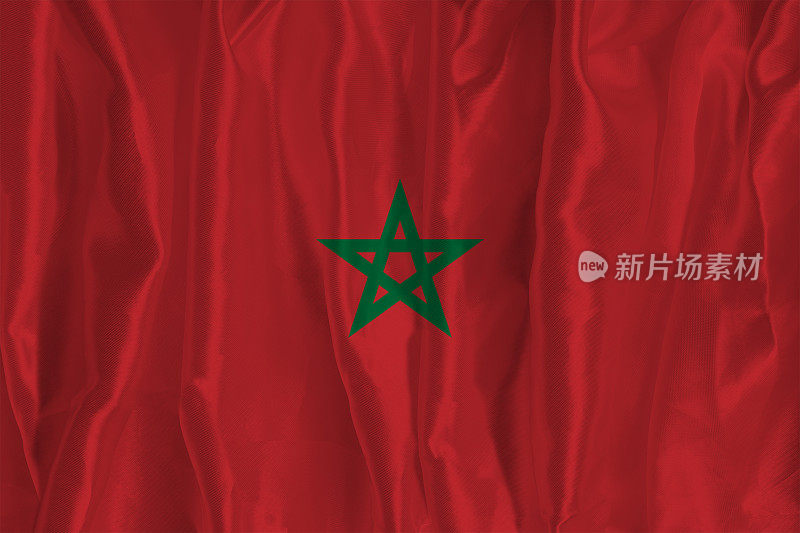 以丝绸为背景的摩洛哥国旗是一个伟大的国家象征。国家的官方国家象征