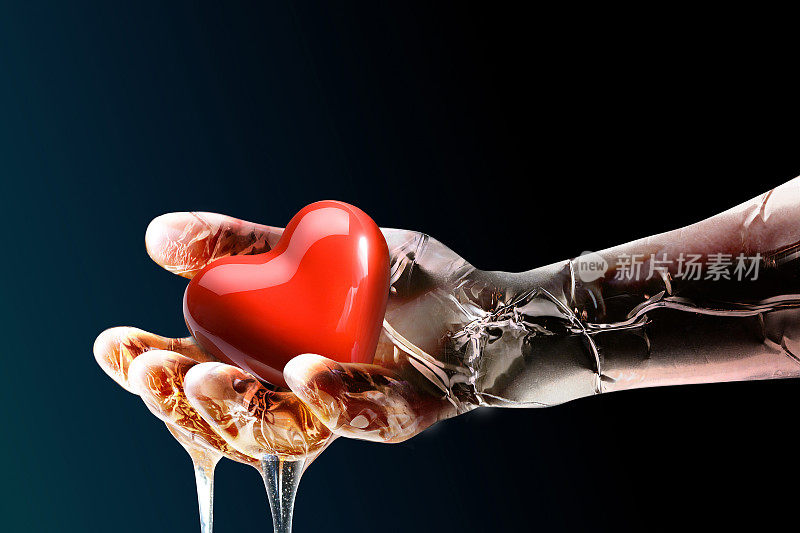 医用机器人的金属人工智能机器人的手抓住了一个红色的心形心脏。