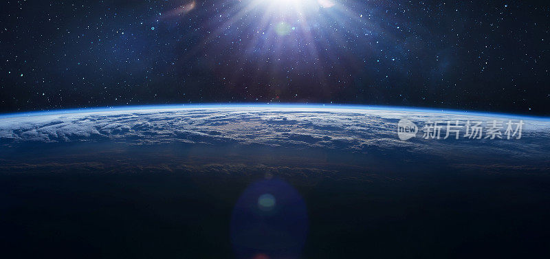 地球在外层空间。轨道的行星。背景是阳光和星星。银河系。这张图片的元素是由美国宇航局提供的
