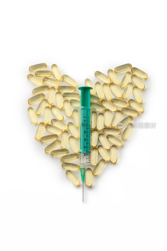 欧米加3药片。鱼油补充胶囊和注射器